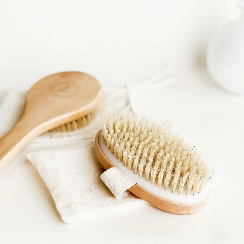 dry brushing tools sitting on white background